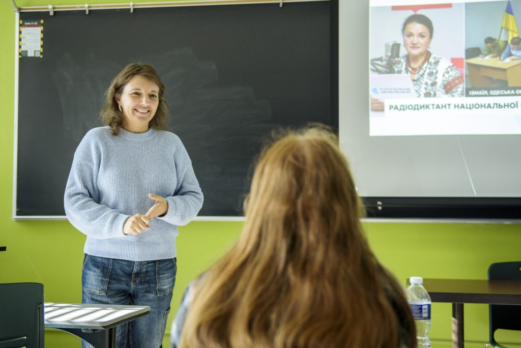 Dr. Kseniia Borodin speaks to a class