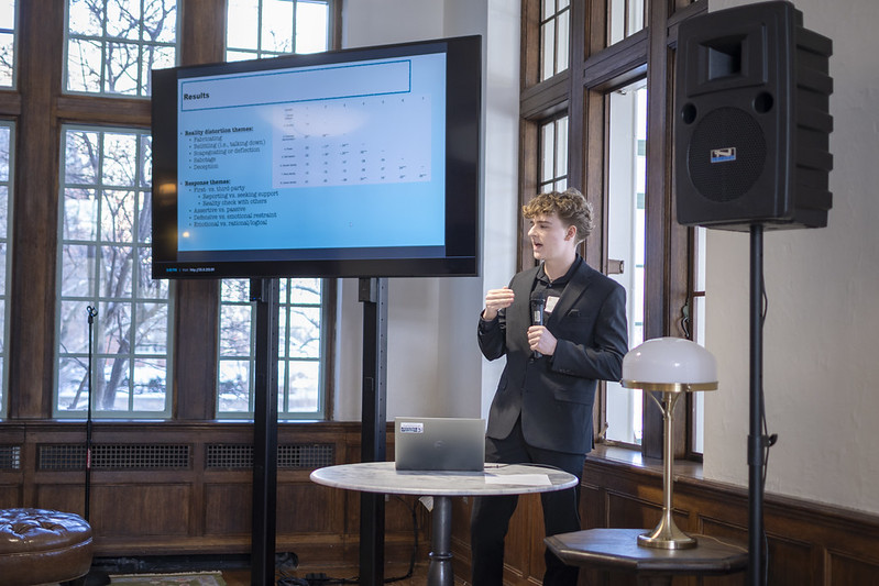 Liam Peck gives his research presentation.