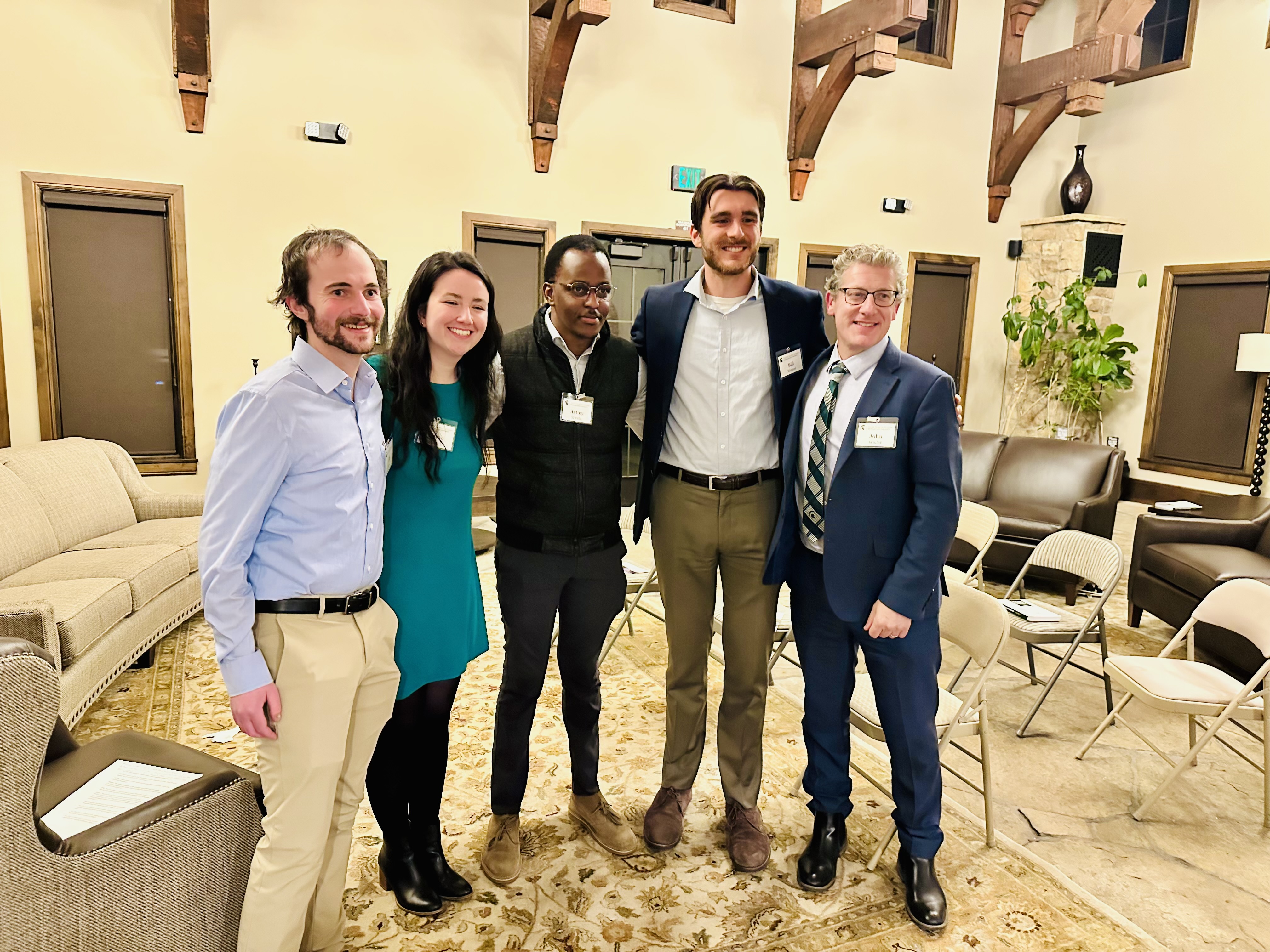 John Waller poses with a group of MSU Alumni and Scholars