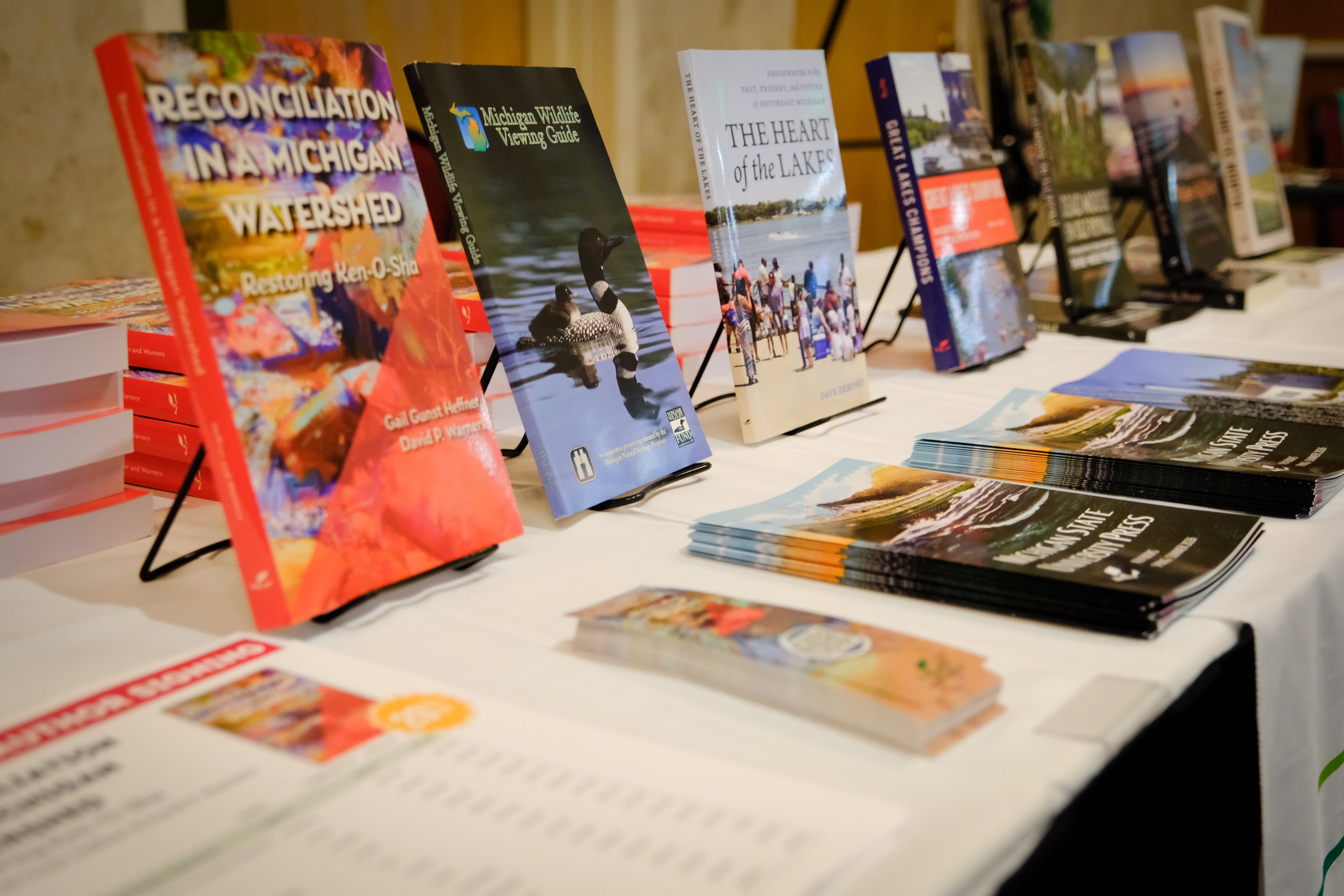 A display of books about Michigan wildlife and watershed