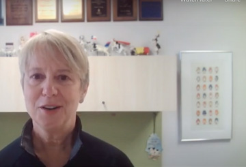 Dr. Ruegg talking in office