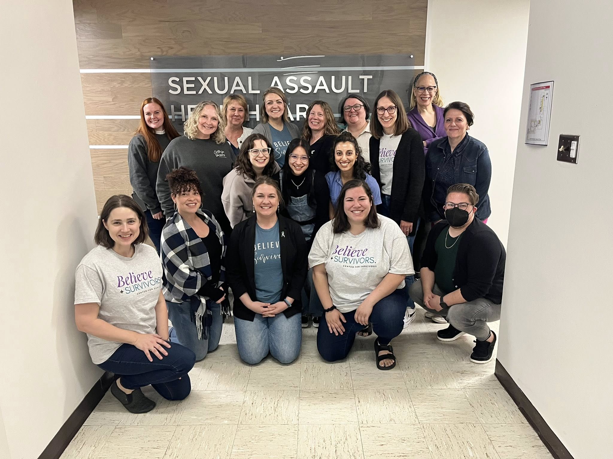 Center for Survivors staff group photo dressed in denim for Denim Day