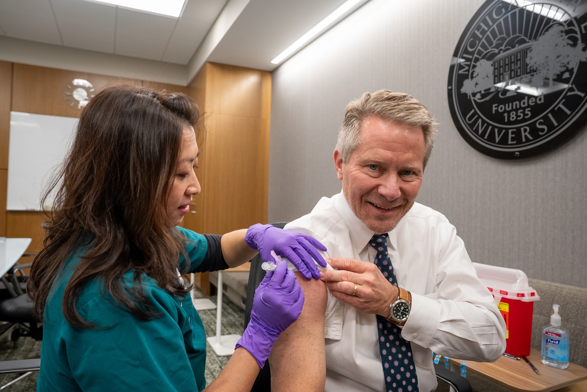 MSU President, Kevin Guskiewicz, receiving his flu shot