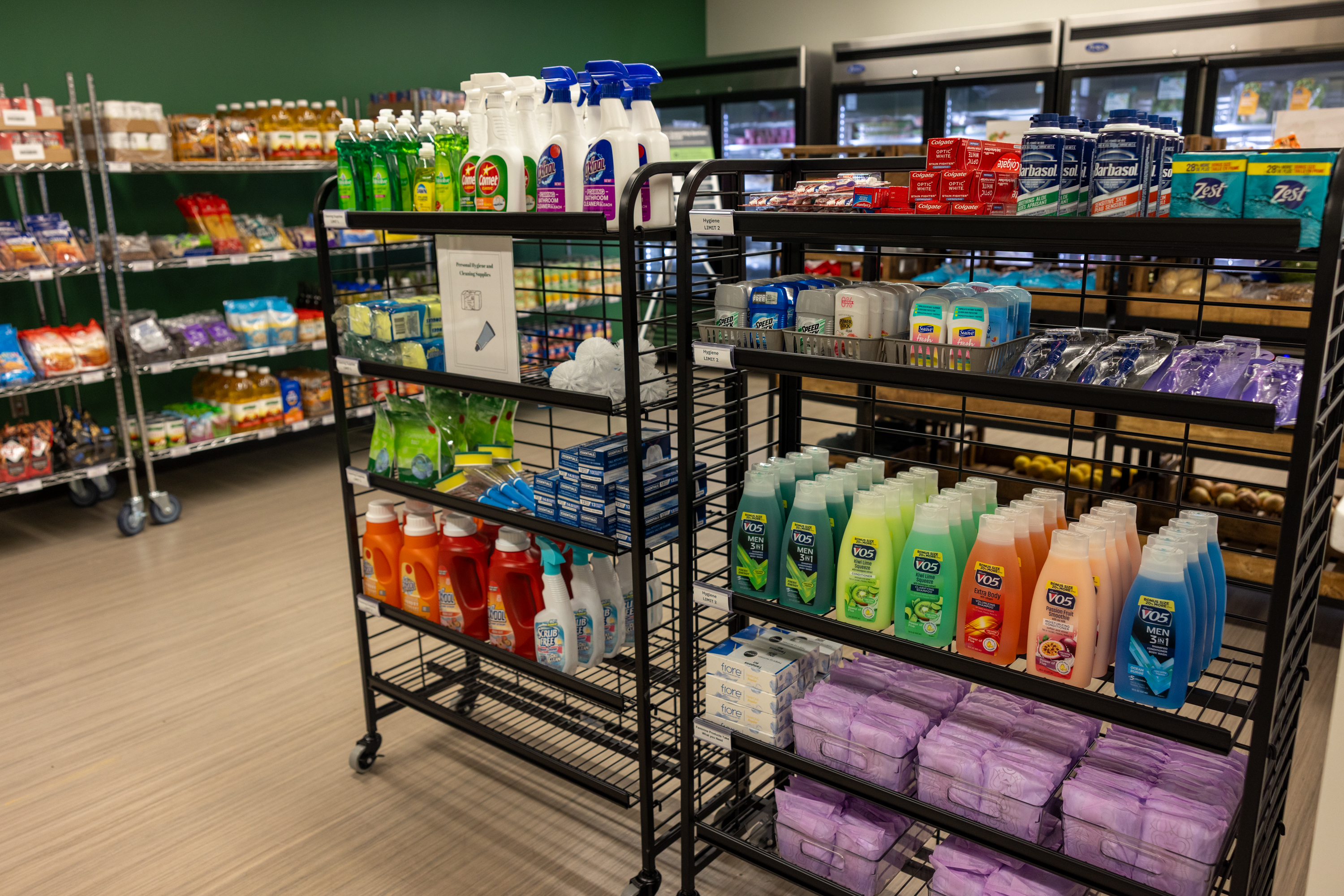 Inside the Spartan Shelf Union featuring personal hygiene products, cleaning supplies, and food items