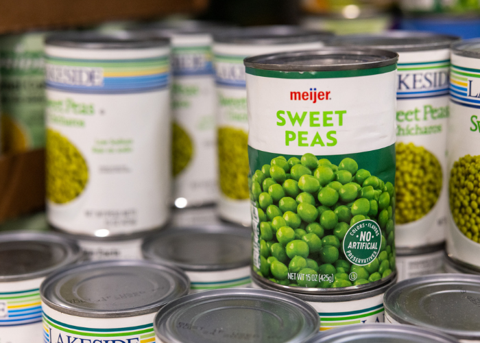 Shelf of canned sweet peas
