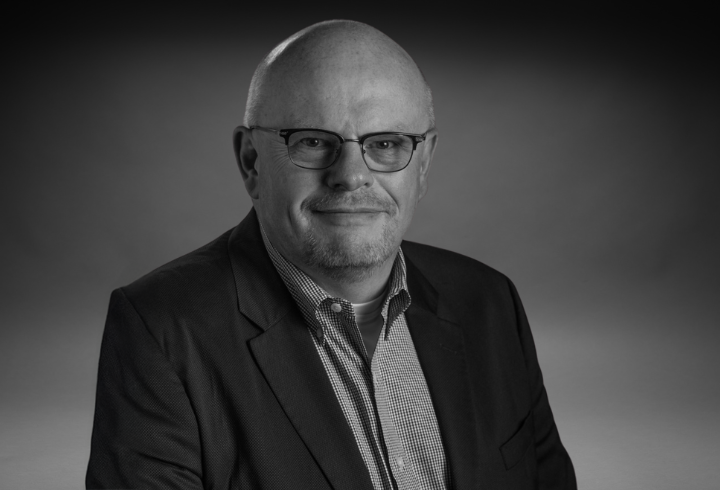 Black and white headshot of OPDM director Jerry Rhead.