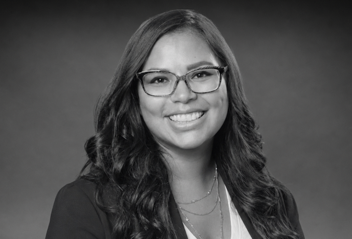 Black and white headshot of Learning Experience Designer Sarah Wellman.