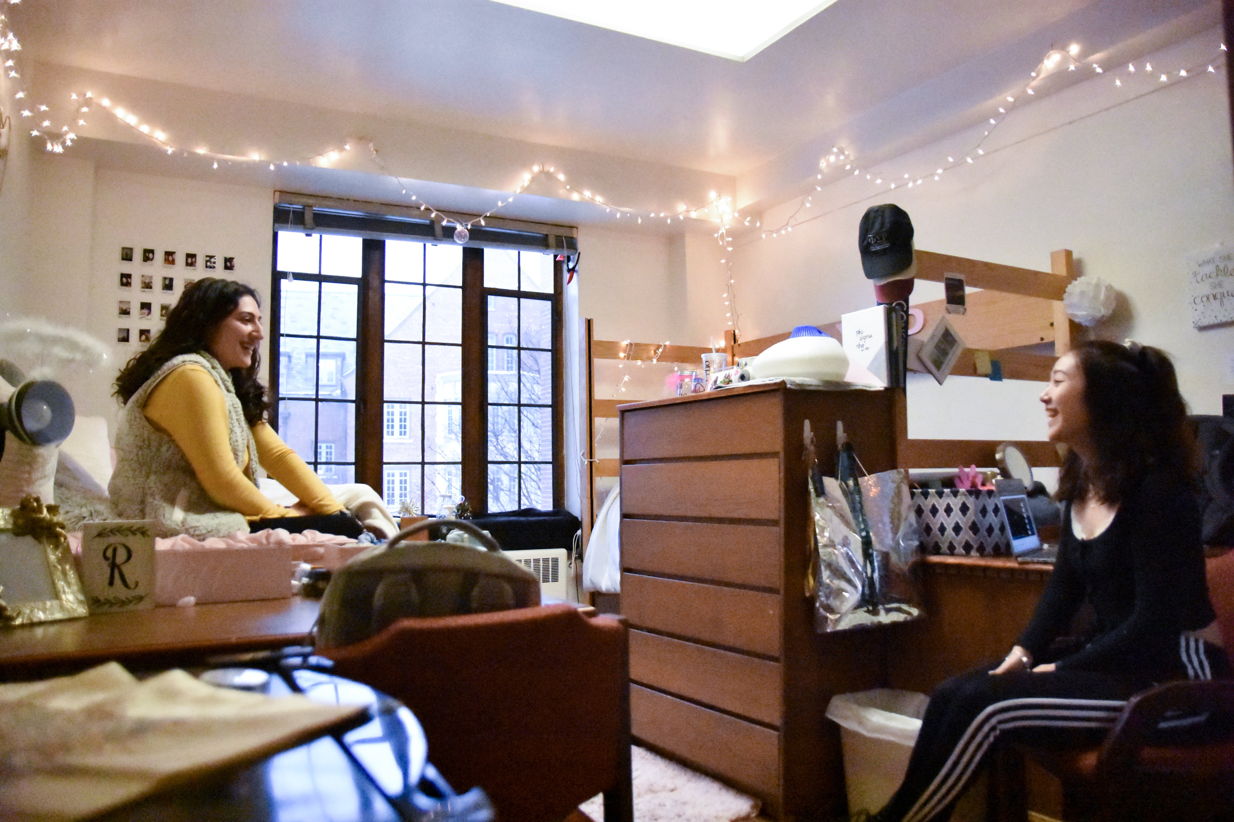 Two MSU students relaxing in their residence hall room