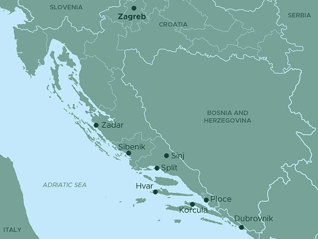 A map of Croatia highlighting key cities and locations along the Adriatic coast. Marked destinations include Zagreb, Zadar, Šibenik, Sinj, Split, Hvar, Korčula, Ploče, and Dubrovnik. The map shows the Adriatic Sea to the west and neighboring countries Slovenia, Bosnia and Herzegovina, and Serbia. It provides a geographical overview of Croatia and its coastal region.