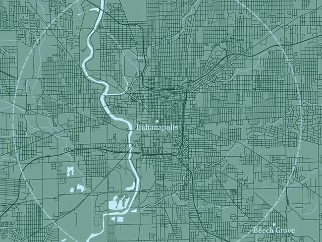 A map of Indianapolis, Indiana, displaying detailed street grids and the White River flowing through the city. The map highlights urban and suburban areas, with key locations and neighborhoods, including Beech Grove, marked for context. A circular boundary encompasses the central region of the city.