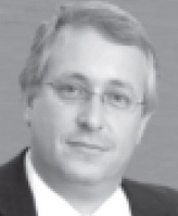 black and white professional headshot of Monte L. Falcoff