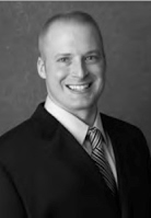 Professional headshot of Eric Seger