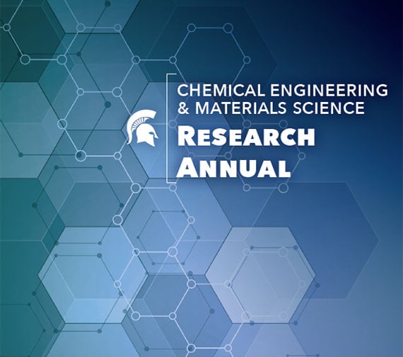 The cover of the CHEMS Research Annual Report features a pattern of overlapping honeycombs. A small white Spartan helmet is visible near the text that reads 'Chemical Engineering & Materials Science Research Annual.' The design is clean and modern, emphasizing the report's focus on cutting-edge research.