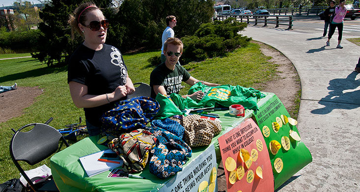 MSU Student members of the nonprofit organization Core Group Member of GO* MSU, sell shirts, stickers and bags to raise money for the hospital in Africa. Their motto is that "everything is impossible until it's been done!"