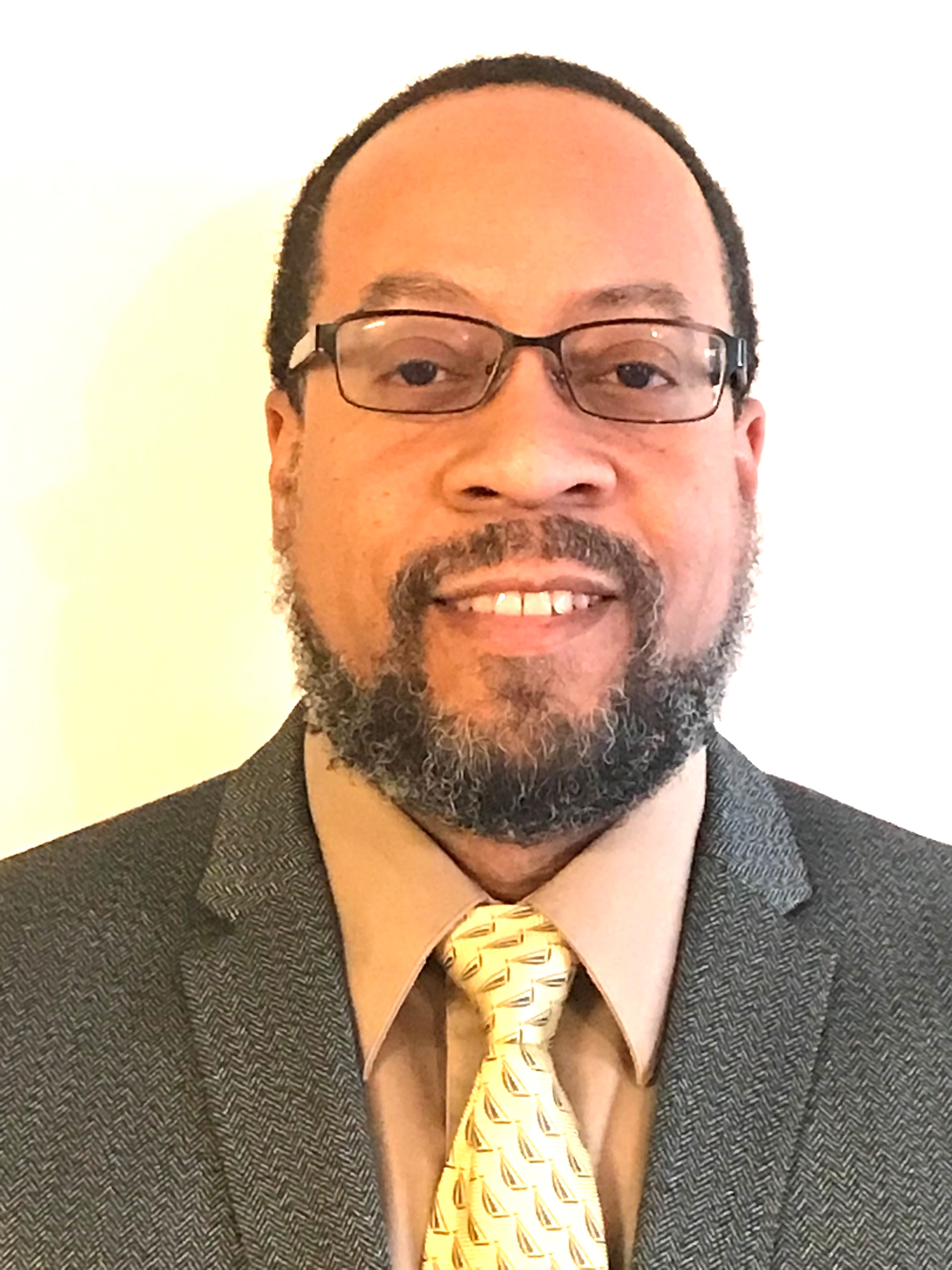 Professional headshot of Doctor Charles Macon