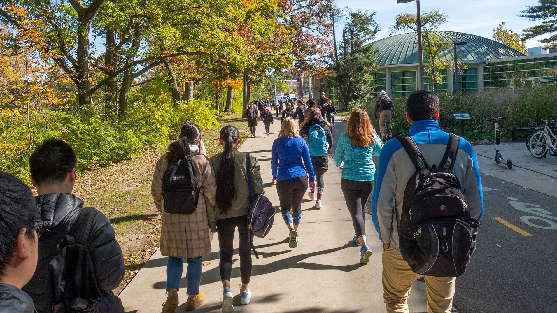 students walking on the bridge