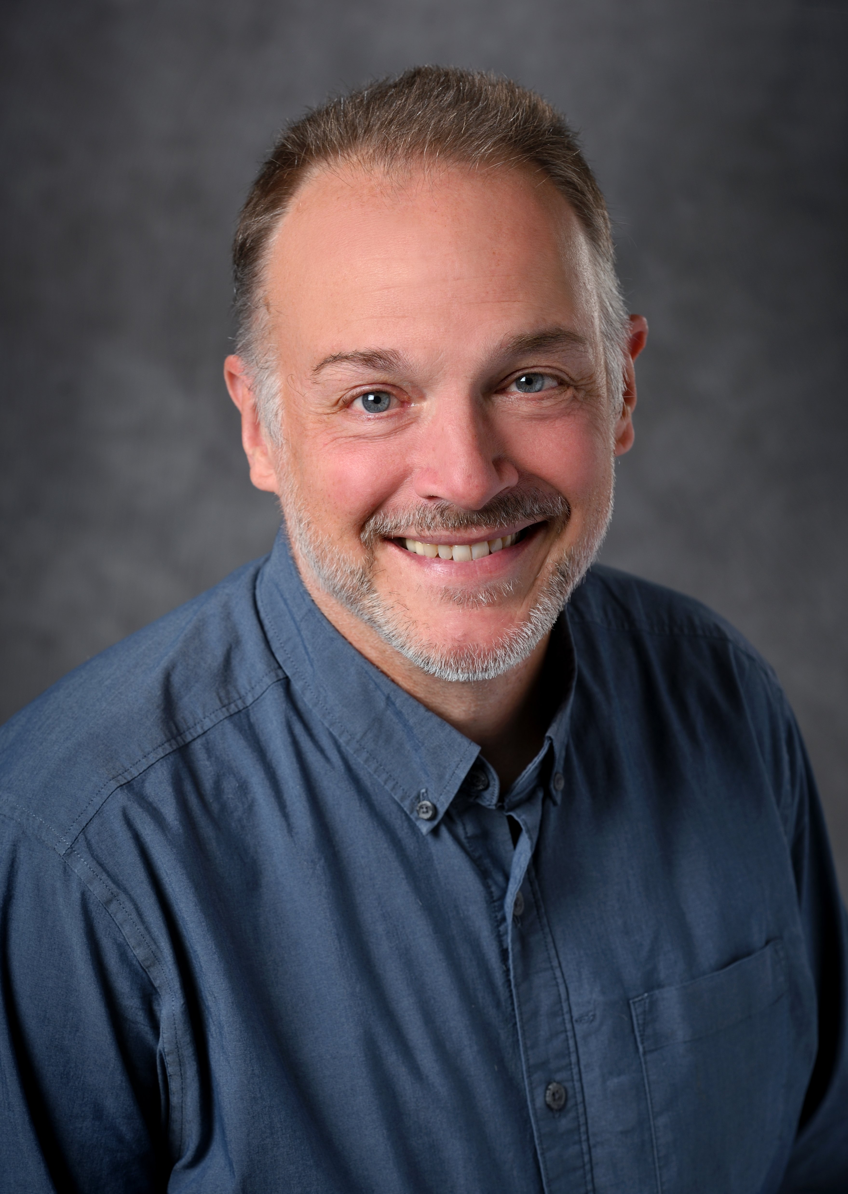 Professional headshot of Scott Calabrese Barton