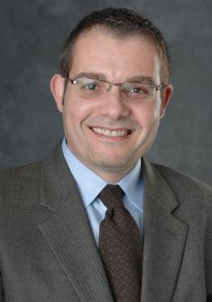 Professional headshot of Karim Chatti
