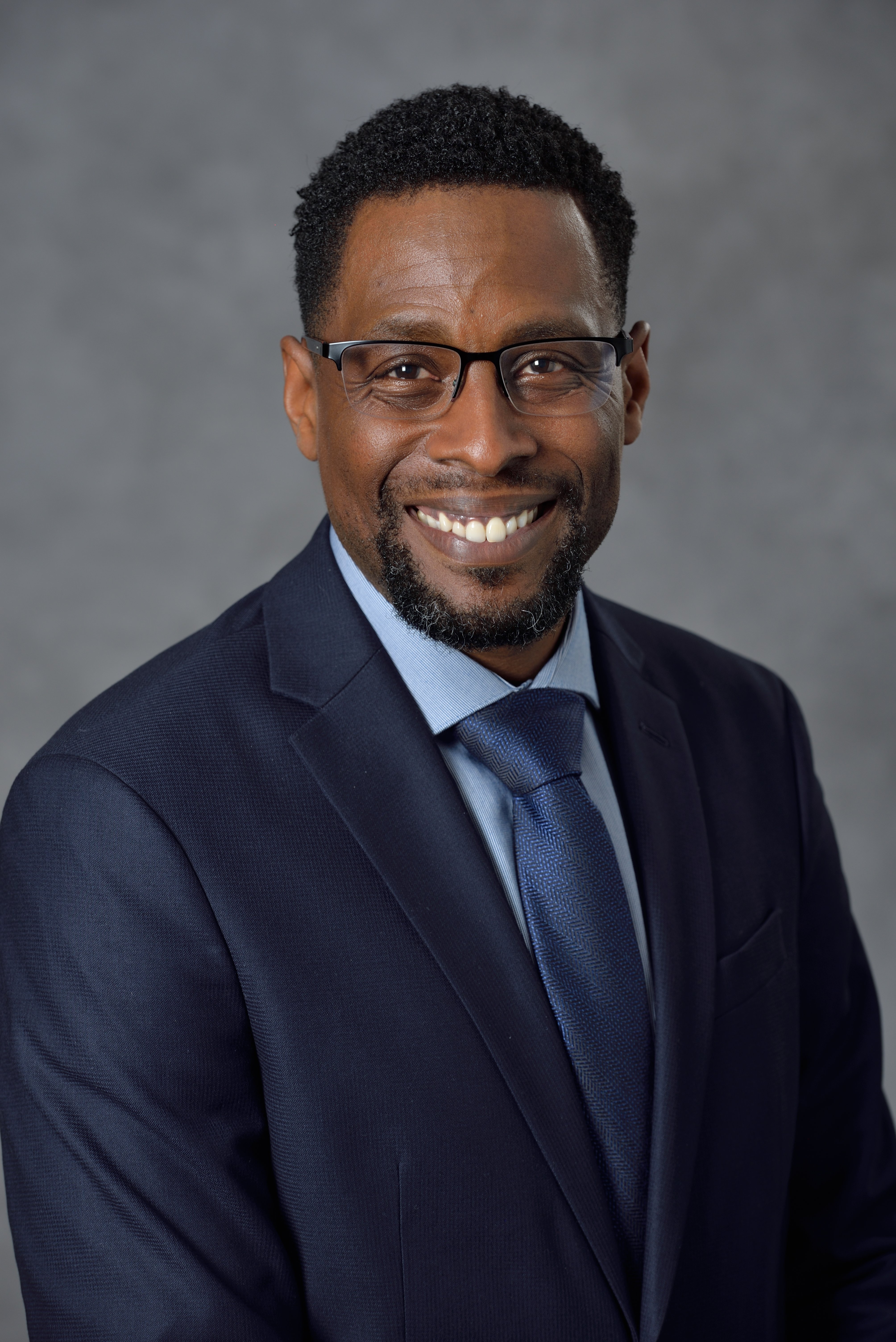 Professional headshot of Kyle Foster