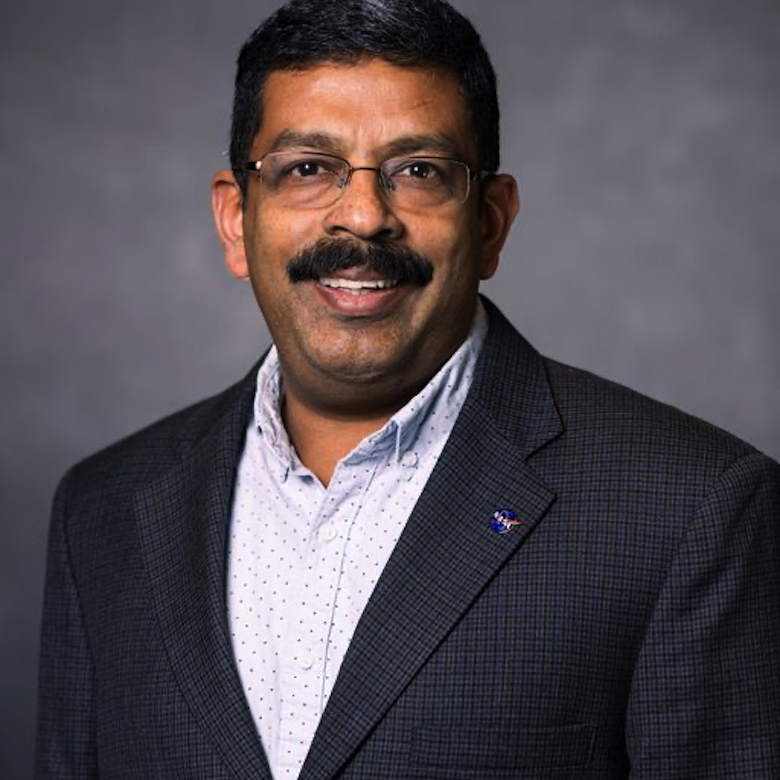 Professional headshot of Narendra Das