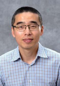 Professional headshot of Yang Guo