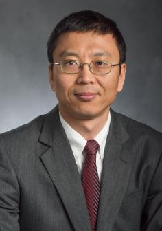 Professional headshot of Ming Han