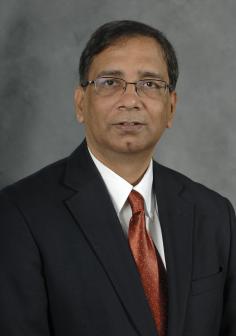 Professional headshot of Syed Hashsham