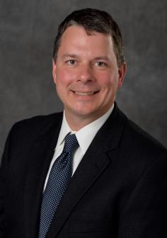 Professional headshot of Andrew Hazel