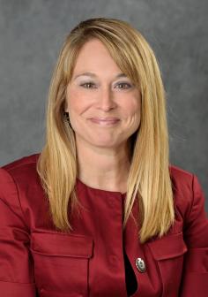 Professional headshot of  Lori Hitchens
