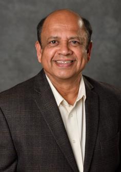 Professional headshot of K Jayaraman