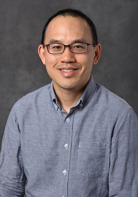 Professional headshot of Kevin Liu