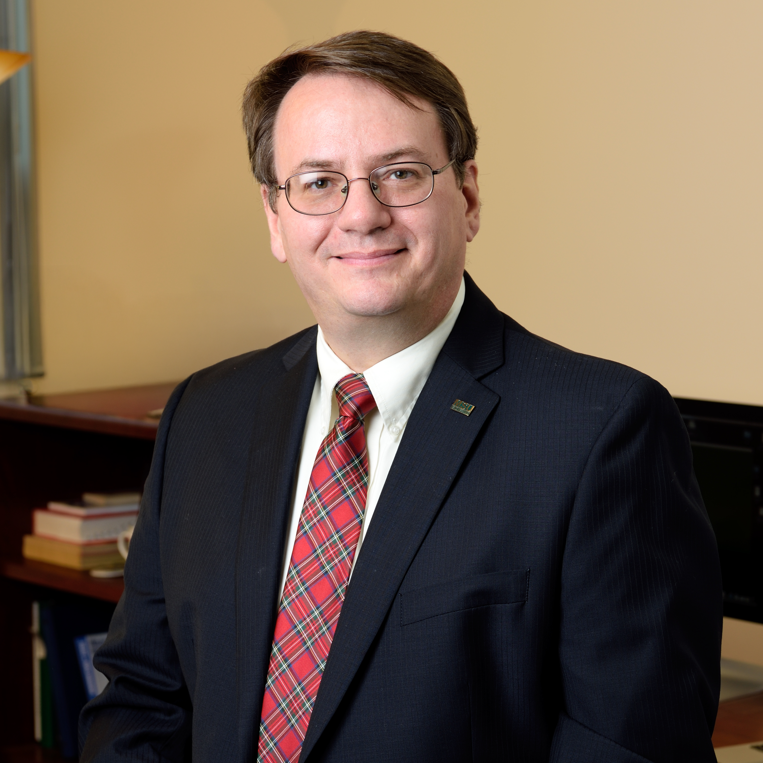 Professional headshot of Leo Kempel