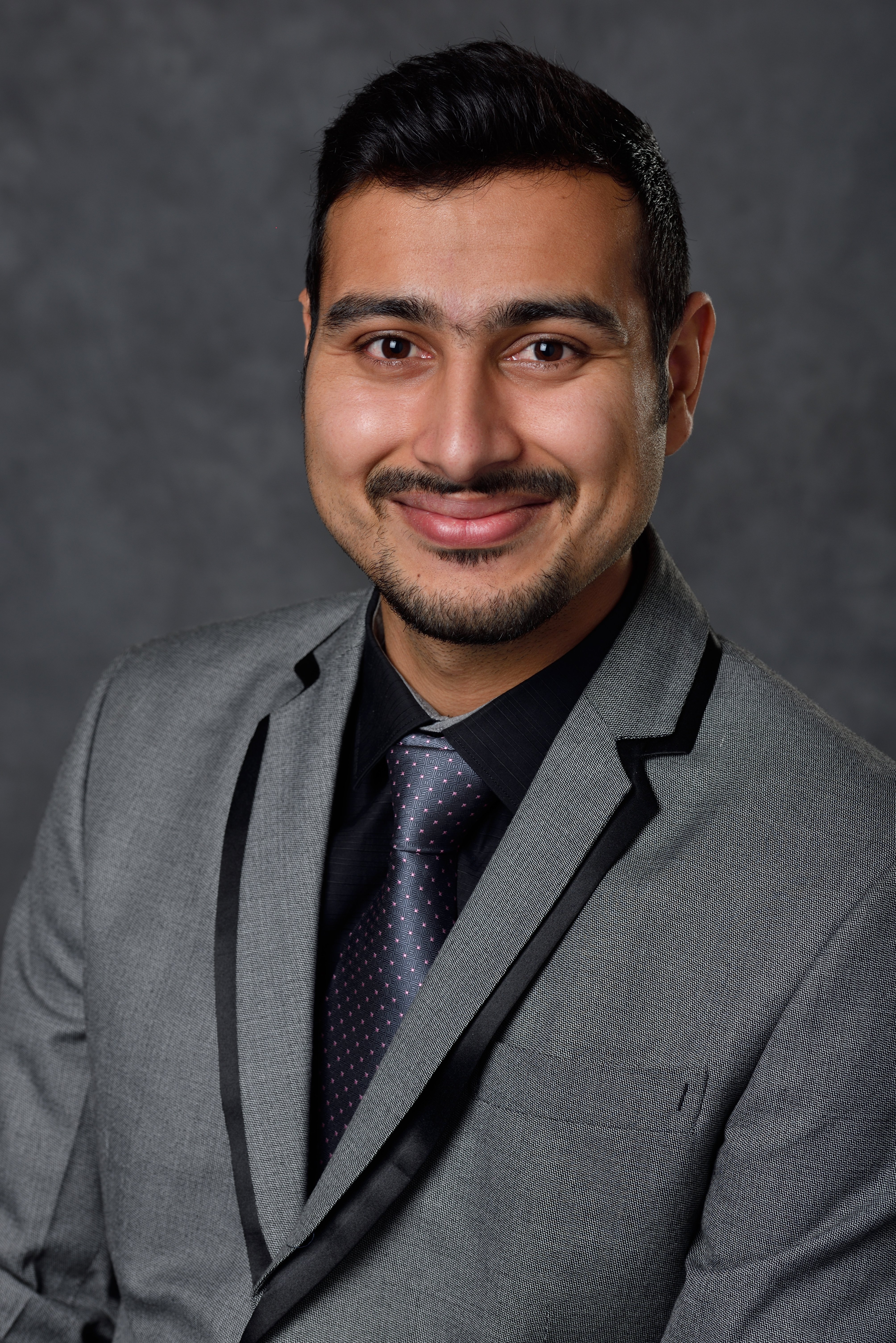 Professional Headshot of Puneet Kumar