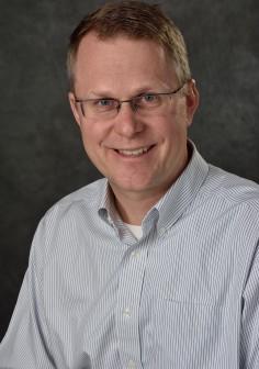 Professional headshot of Robert McGough