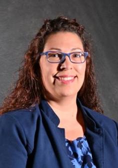 Professional headshot of Casie Medina