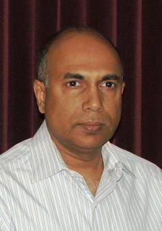 Professional headshot of Joydeep Mitra