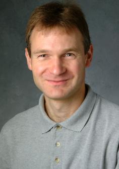 Professional headshot of Norbert Mueller