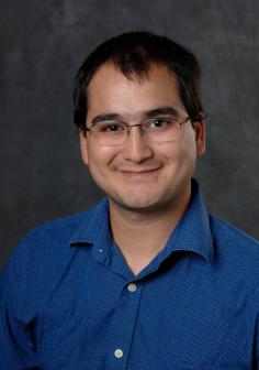 Professional headshot of Joshua Nahum