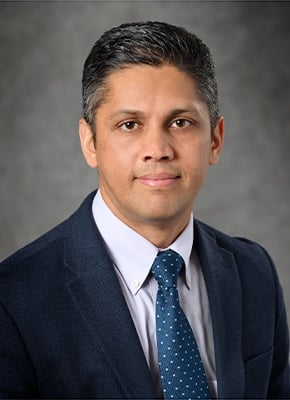 Professional headshot of Yadu Pokhrel