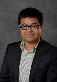 Professional headshot of Zhen Qiu