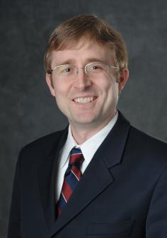 Professional headshot of  Christopher Saffron