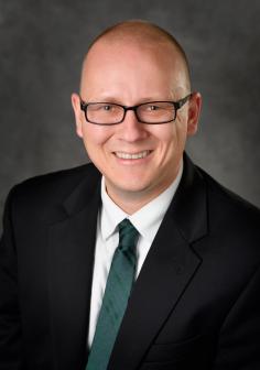 Professional headshot of Peter Savolainen