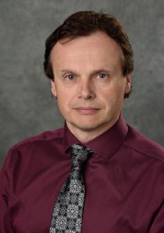 Professional headshot of Thomas Schuelke
