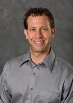 Professional headshot of Bryan Smith