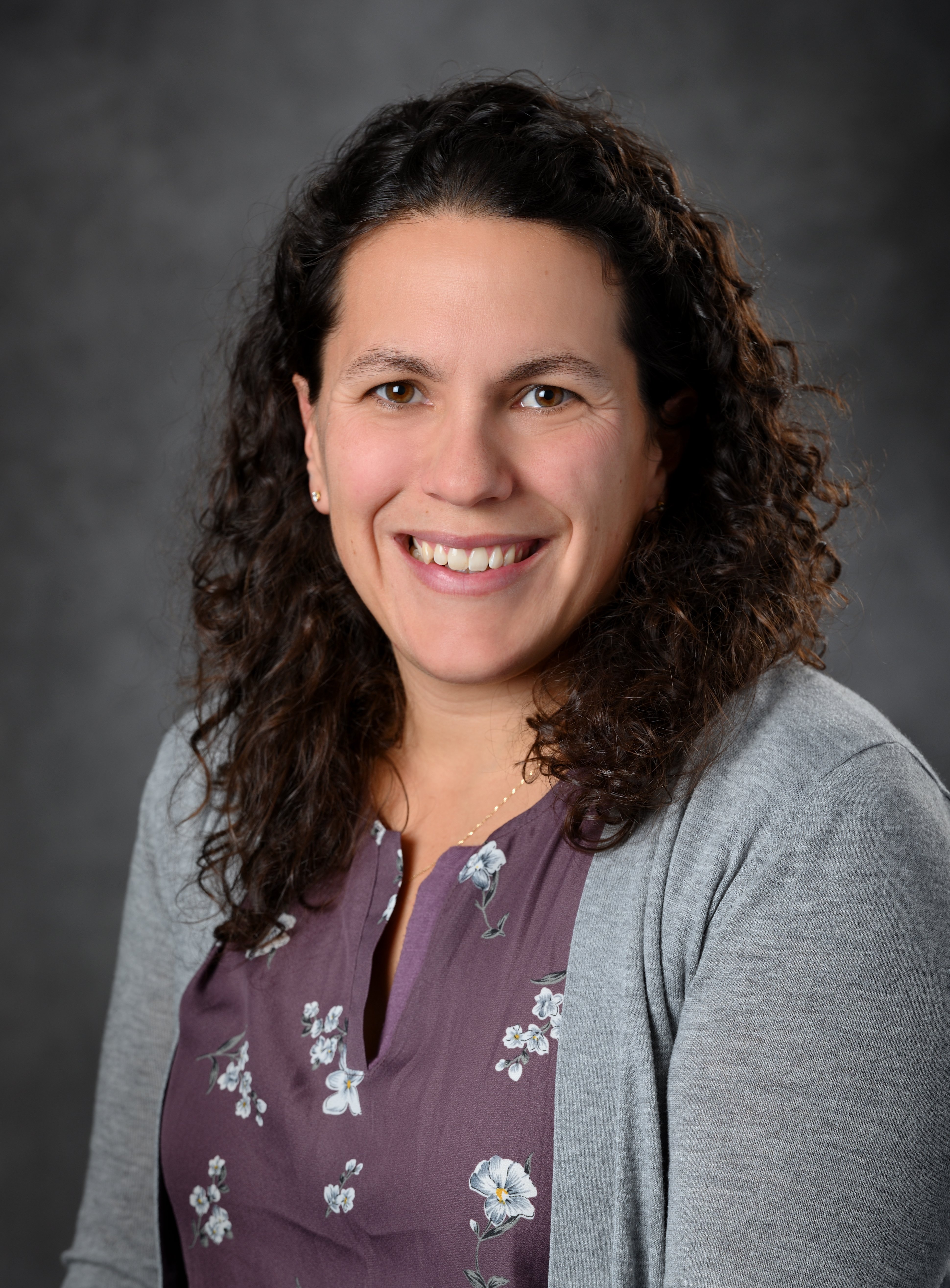Professional headshot of Caroline Szczepanski