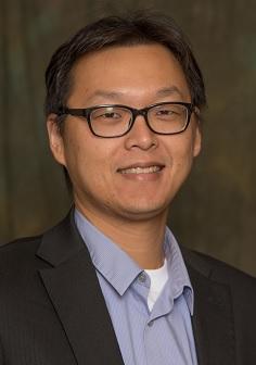 Professional headshot of Guan-Hua Tu