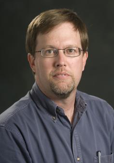 Professional headshot of Brian Wright
