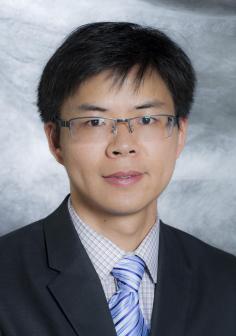 Professional headshot of Huacheng Zeng