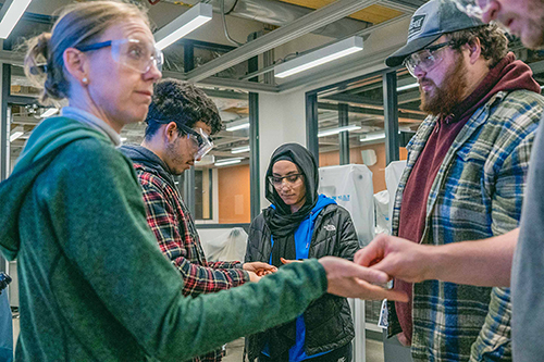 Anne Eisenlohr (left) is a teaching specialist in the Department of Chemical Engineering and Materials Science. “Students appreciate the hands-on work in the labs. You can really see the concepts before your eyes,” says Eisenlohr. Photo by Annie Barker.