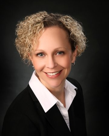 Professional headshot of Kelley Monterusso